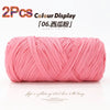 Two pink reusable elastic yarn spools displayed on a white background.