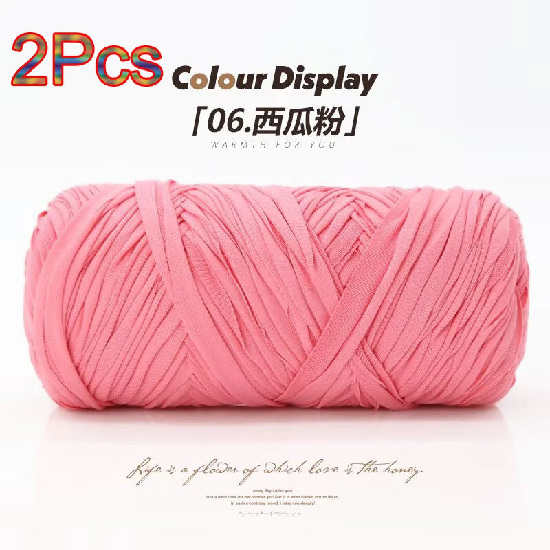 Two pink reusable elastic yarn spools displayed on a white background.