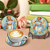A set of six handmade holiday diamond art coasters featuring a snowman design on a light blue background.