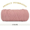 A skein of thick, pink polyester blended yarn is shown rolled up against a white background.
