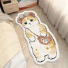 A cute cartoon plush mat featuring a sleepy orange and white cat with pink ears and a brown bear face.