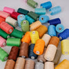 A collection of 10 rolls of high-quality polyester sewing thread in various shades of green, yellow, blue, and brown.