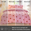 A pink strawberry print duvet cover set shown in four light variations: dim, warm, cold, and natural light.