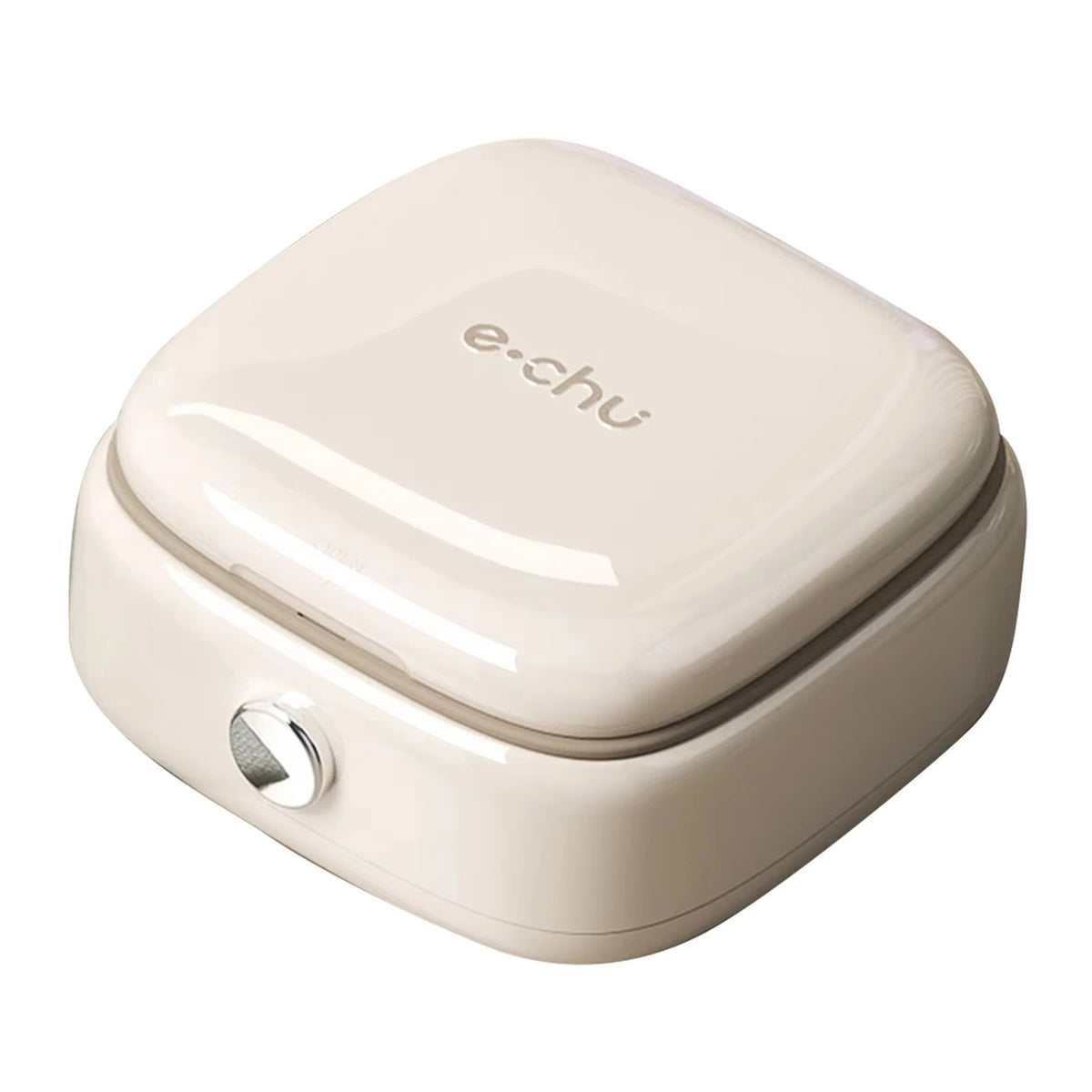 A beige magnetic sewing kit with a lid, featuring a small silver button.