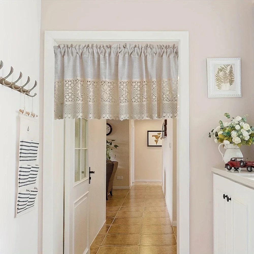A white door with a sheer linen crochet half curtain in beige and white patterns.