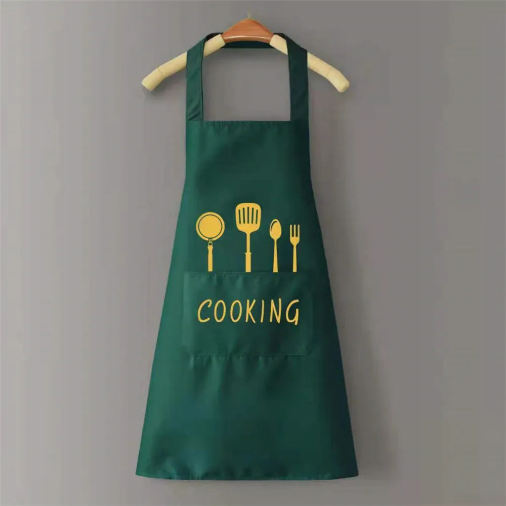 A dark green waterproof oil-proof PVC kitchen apron hanging on a wooden hanger.