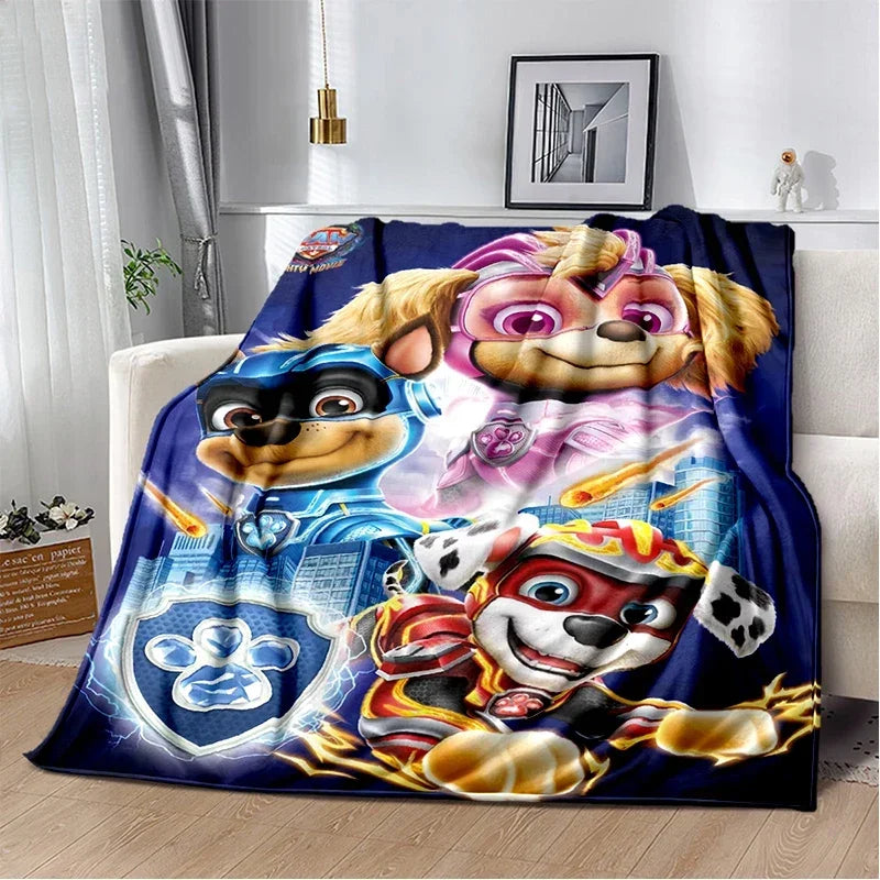 A colorful cartoon dog plush flannel throw blanket featuring characters from the Paw Patrol theme.