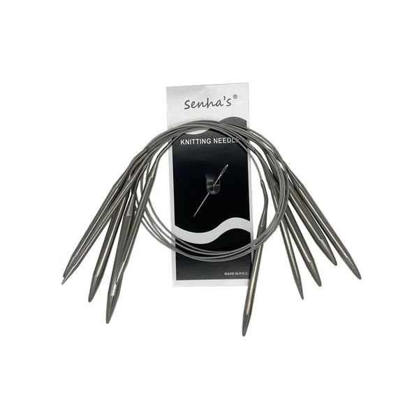 A set of stainless steel circular knitting needles with a black and white label.