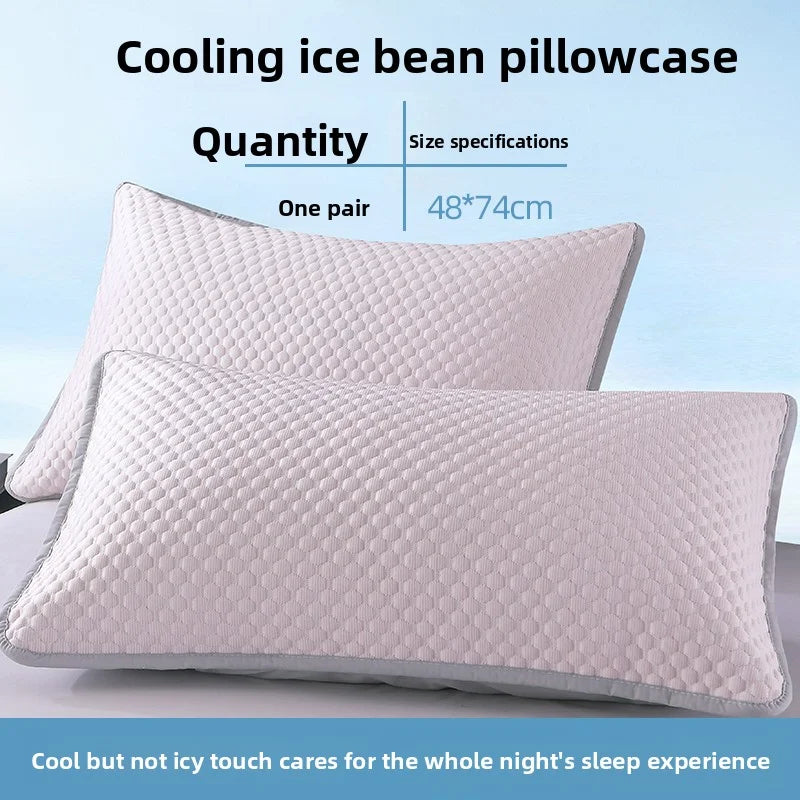 A white cooling ice bean pillowcase is shown next to a folded pillow, emphasizing its use for a cool sleep experience.