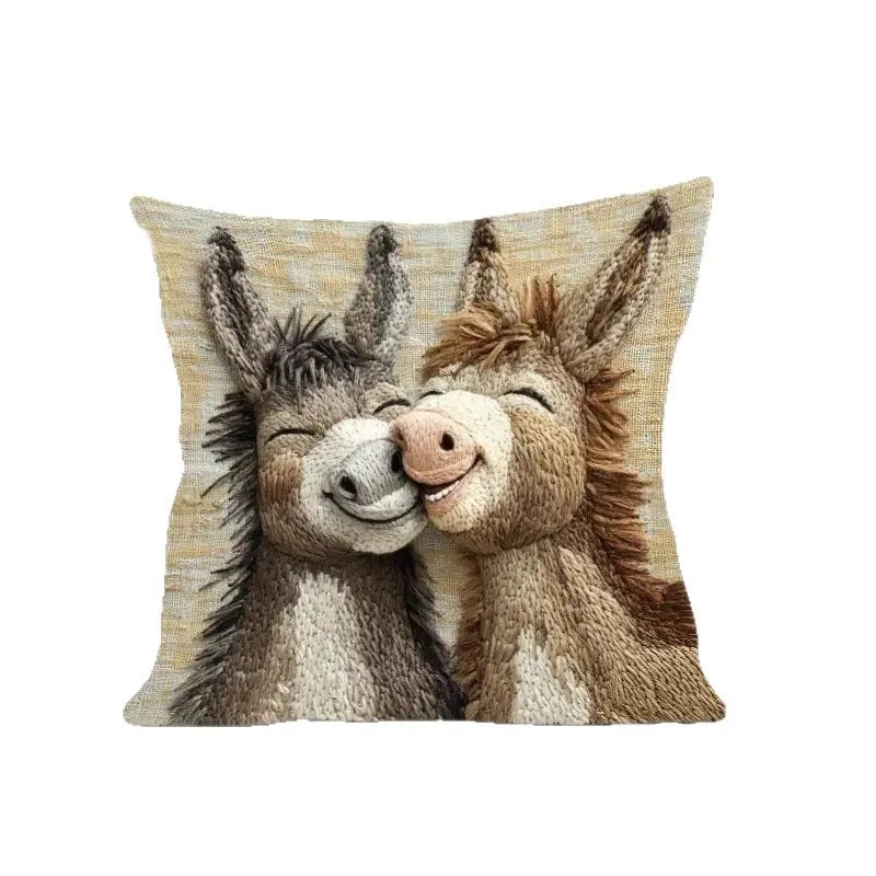 A realistic depiction of two donkey heads in a cartoon style on a pillow cover.