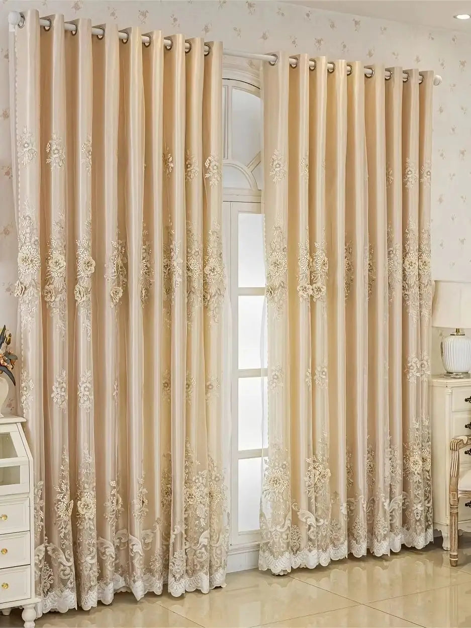 Cream sheer double layer blackout curtains with floral lace detailing hanging in a doorway