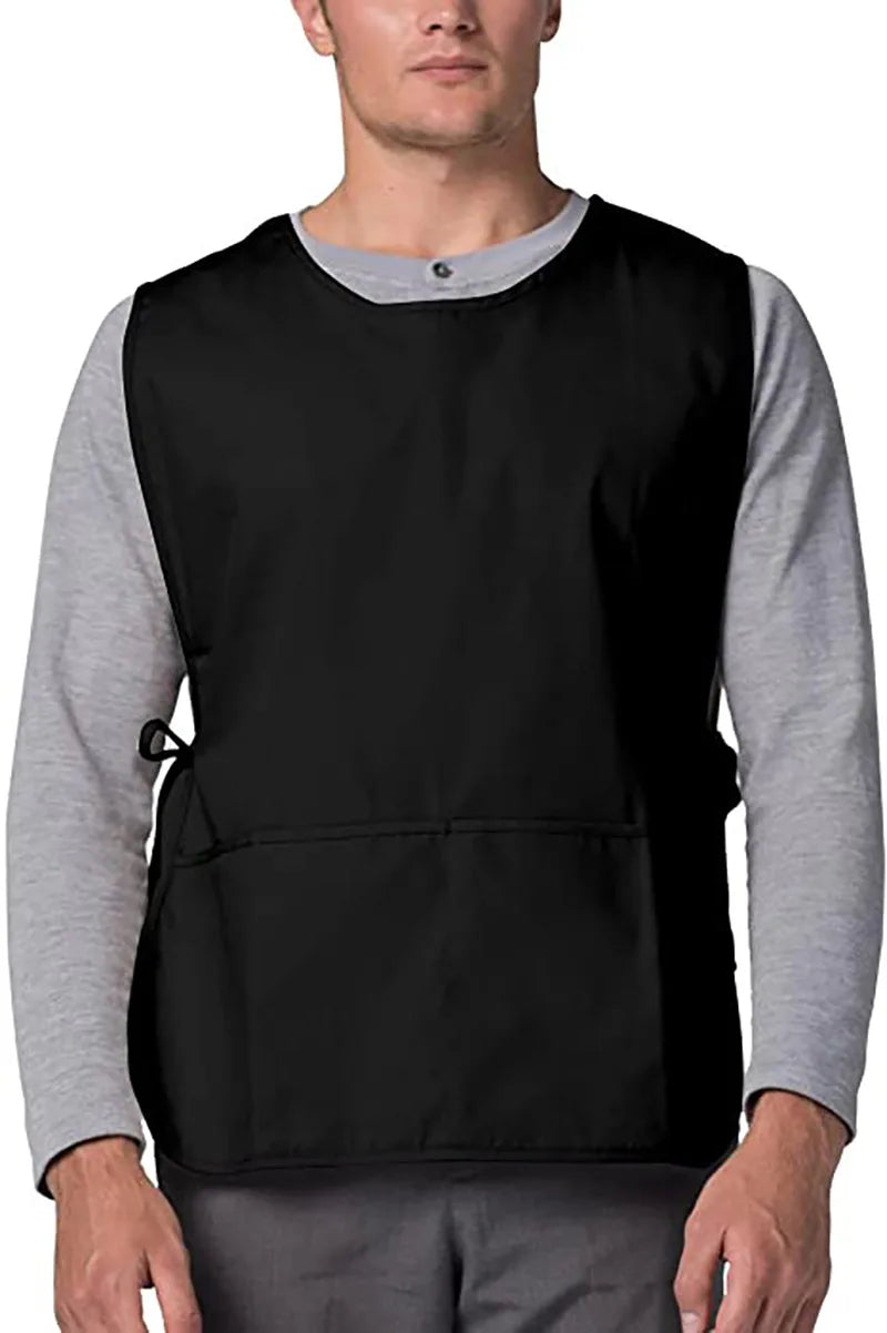 A man wearing a black versatile polyester apron over a gray long-sleeved shirt.