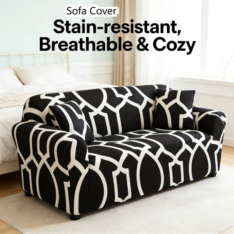 Black and white patterned sofa cover displayed on a light rug in a bright room.