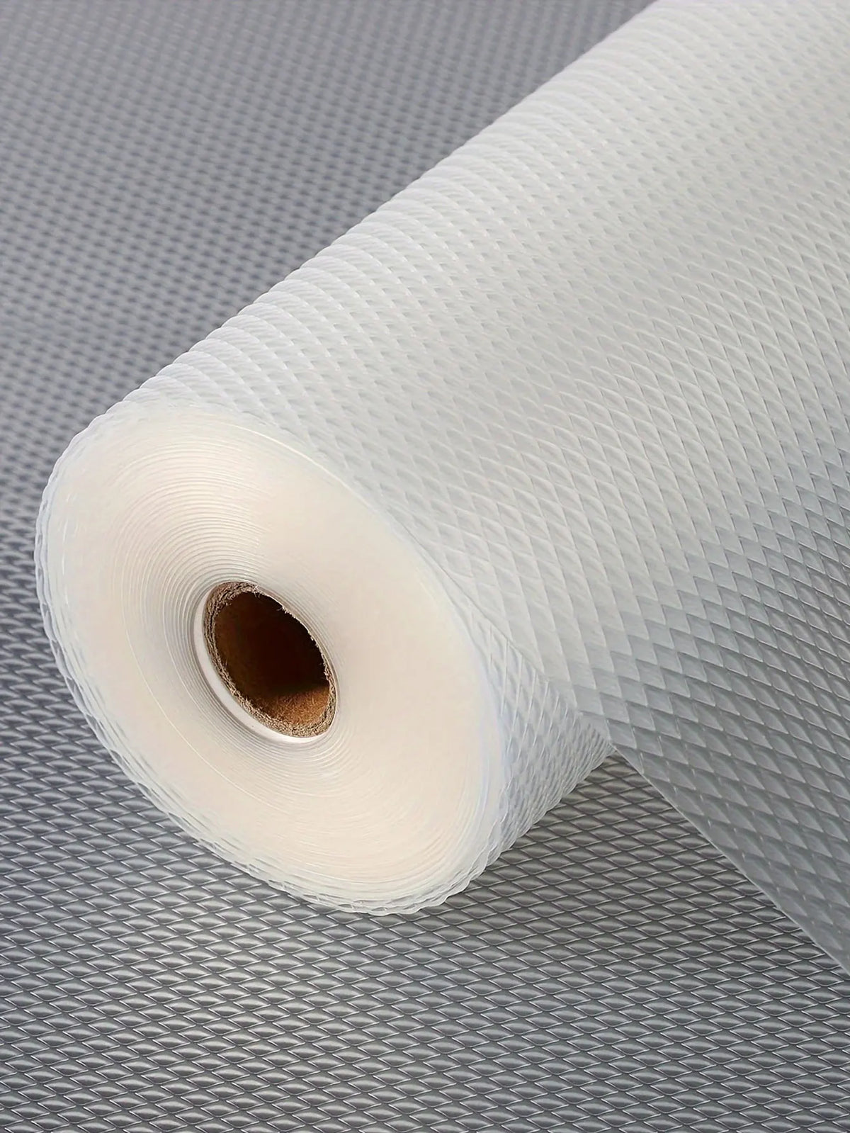 Roll of white reusable EVA drawer liners for kitchen and fridge