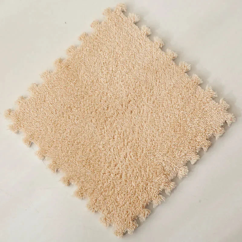 A square beige plush interlocking puzzle rug mat with a textured surface.