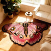 A pink and black irregular shaped plush floor rug is displayed on a wooden floor next to a window.