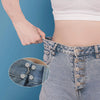 Close-up of adjustable button pins used to fasten denim jeans