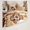 A double-sided, close-fitting plaid blanket in beige and brown tones is shown being used for a cozy sleep experience.