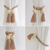 Set of hand-woven wooden curtain tiebacks in natural beige and brown tones