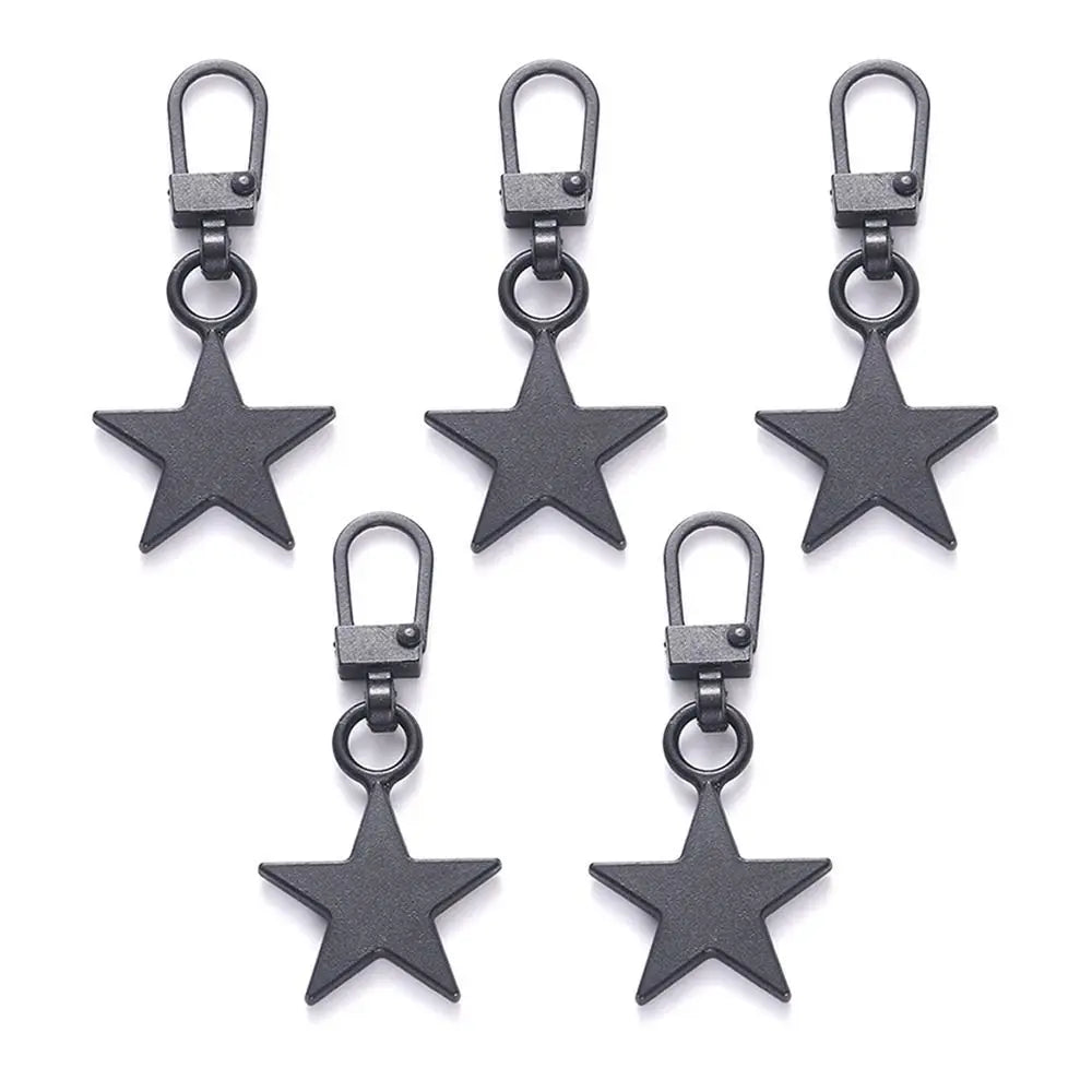 A set of five black metal zipper pull replacement kits with star-shaped charms and loops.
