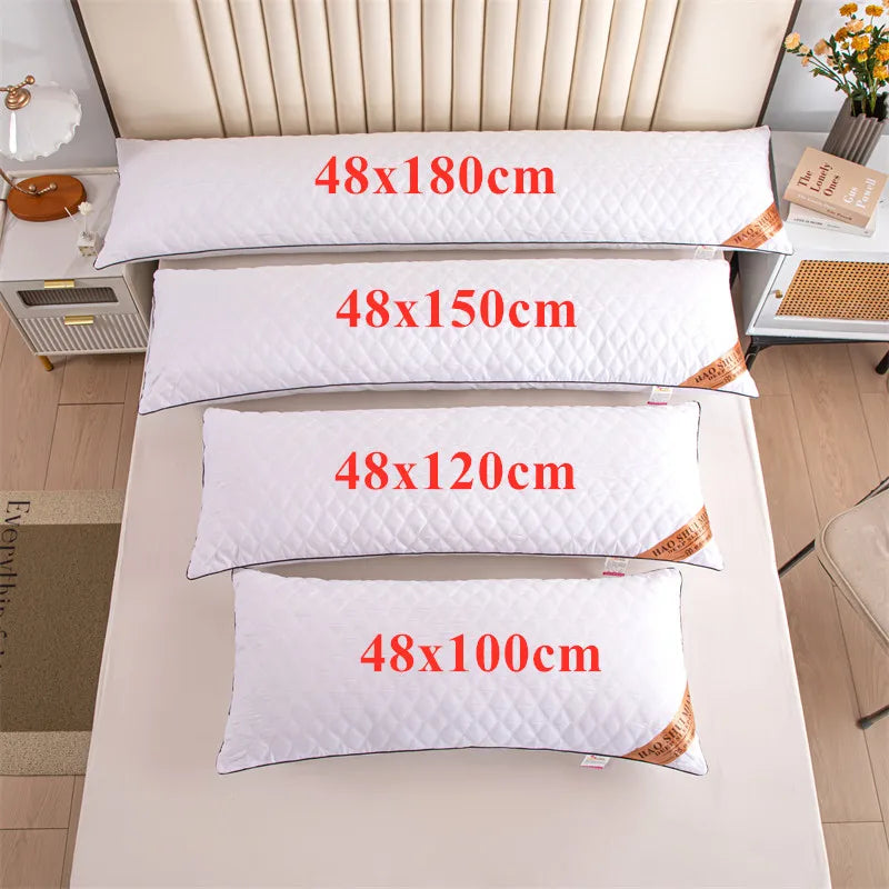 A set of four white rectangular sleeping pillows with sizes 48x180cm, 48x150cm, 48x120cm, and 48x100cm displayed on a table.
