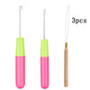 Three plastic latch hooks in lime green and pink colors for crochet and crafting