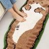 A brown and white decorative cat mat is shown with a person's foot resting on it.