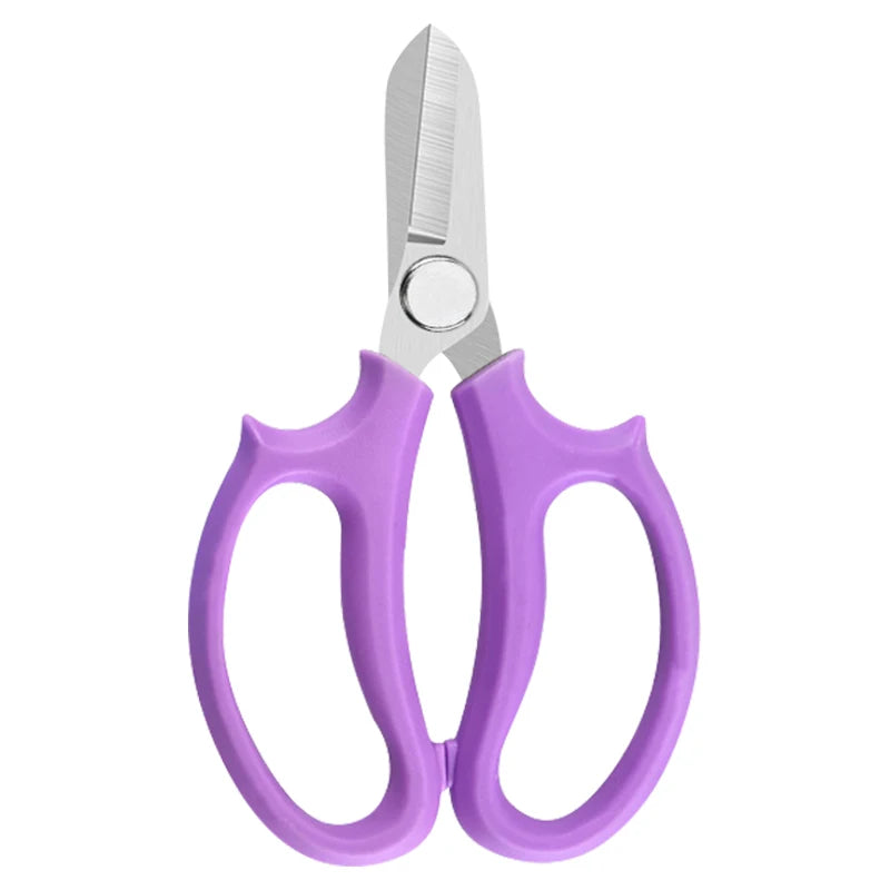 A pair of purple precision shears with a silver blade and comfort grip handles.