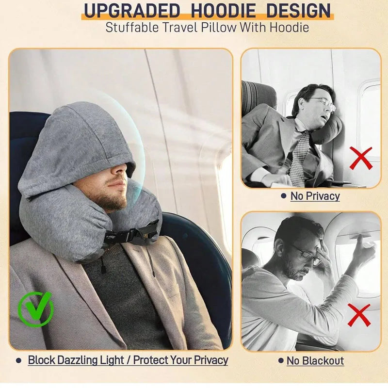 A gray hoodie shaped travel pillow is shown being used by a man in an airplane seat.