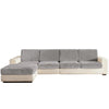 A modern, light gray sectional sofa with beige trim and plush seat cushions.