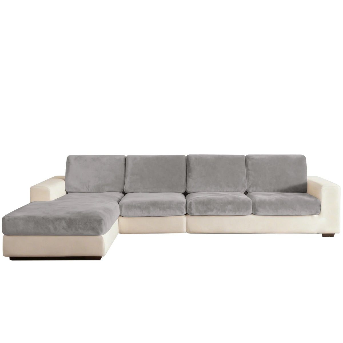 A modern, light gray sectional sofa with beige trim and plush seat cushions.