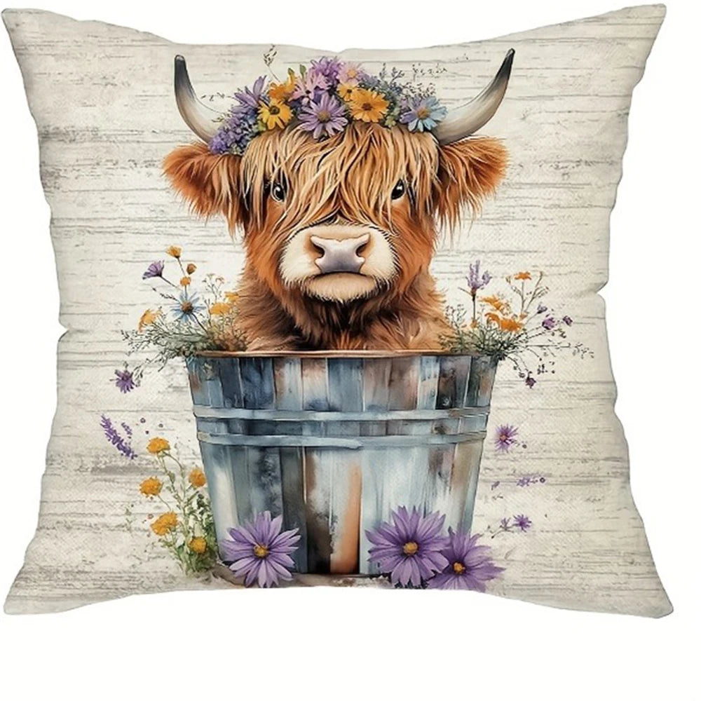 A decorative pillow cover featuring an adorable Highland cow print with horns and a floral crown.