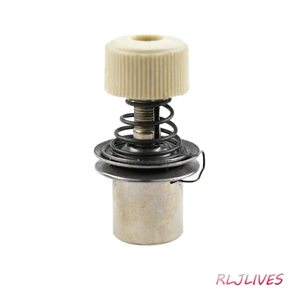A universal sewing machine gripper with a light beige plastic collar and a metal spring mechanism.