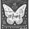 A black throw blanket featuring a butterfly design and text wishing love to mom