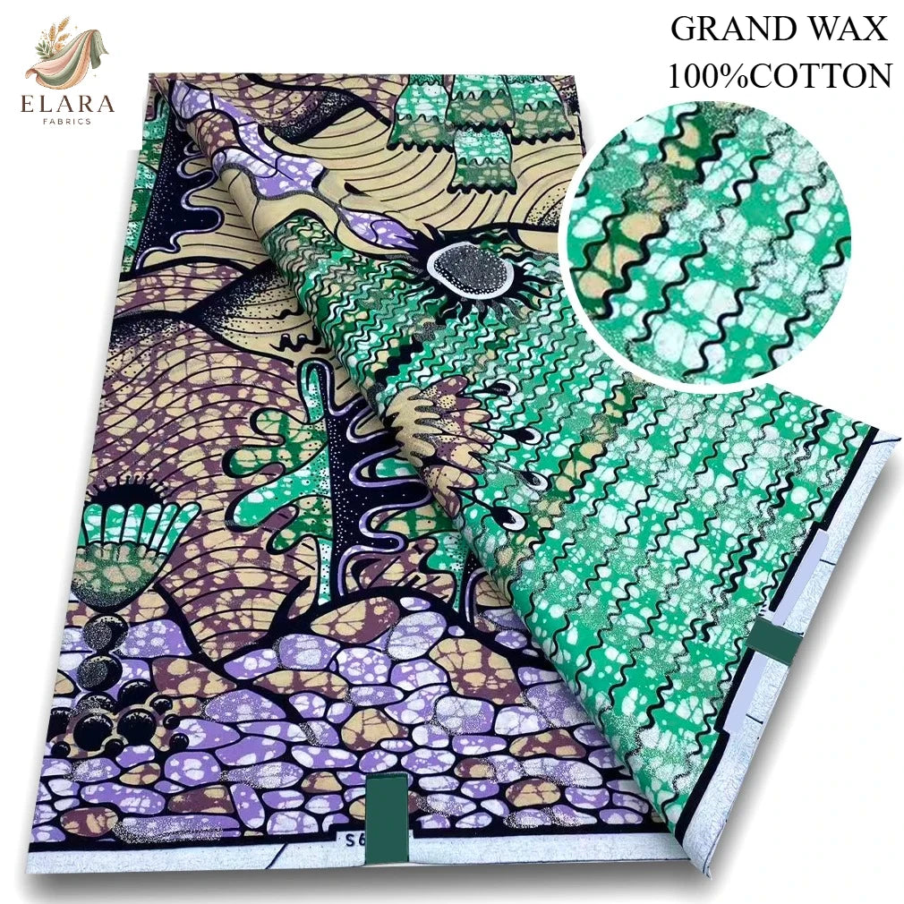 A bolt of grand wax print fabric featuring intricate patterns in purple, green, and black on a white background.