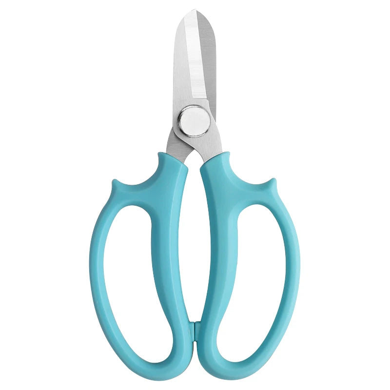 A pair of light blue precision shears with comfort grips and a silver blade.
