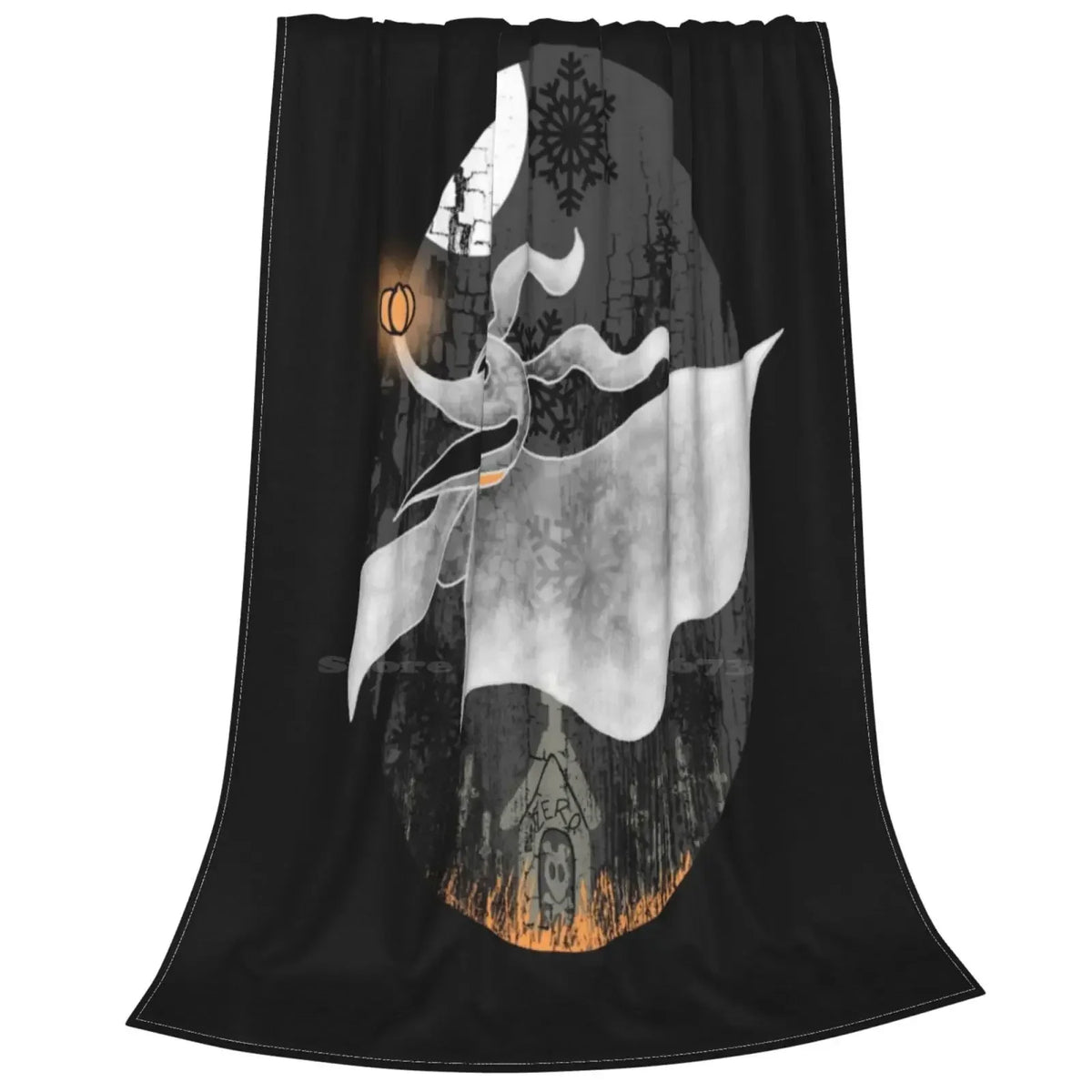 A dark gray microfiber throw blanket featuring a white silhouette of a stylized, swirling design and a small snowflake.