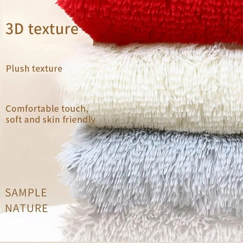 A stack of three textured fabric samples in red, white, and blue showing different textures like 3D, plush, and sample nature