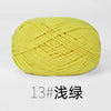 A ball of bright yellow 13-ply knitting yarn for crafts.