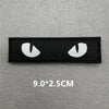 A pair of black 3D tactical IR reflective patches for clothing, showing the size measurement 9.0x2.5cm.