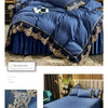 A royal blue bed skirt set featuring elegant lace edging and luxurious fabric in a bedroom setting.