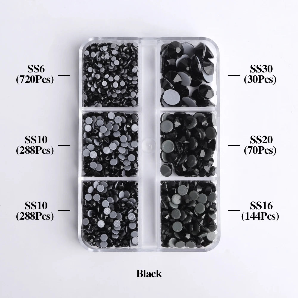 A clear plastic tray containing various sizes of black glass rhinestones categorized by SS6, SS10, SS10, SS30, SS20, and SS16