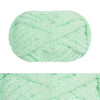 A ball of light mint green hand-knitted wool finger line scarf yarn.