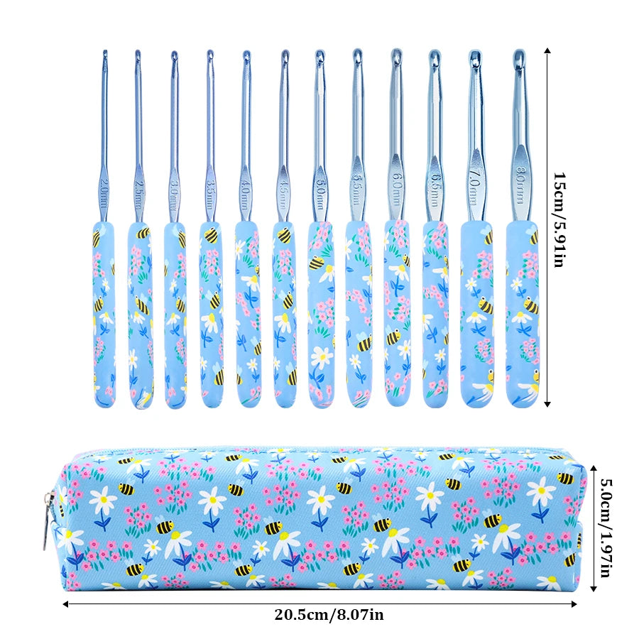 A set of 10 ergonomic crochet hooks in light blue and pink, packaged with a matching blue fabric case.
