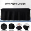 Black one-piece design tablecloth featuring elegant pleats and a tight fit on a rectangular table.