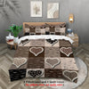 A set of two pillowcases and one quilt cover featuring a brown and black patterned design.