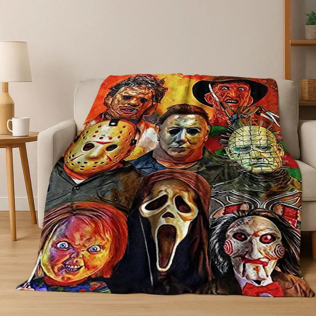 A colorful flannel throw blanket featuring various horror movie characters and monsters.