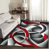 Abstract geometric area rug featuring swirling red and gray patterns on a dark floor.