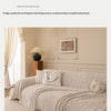A beige herringbone chenille sofa cover draped elegantly in a living room setting.