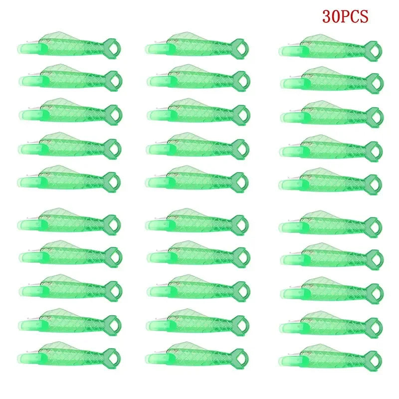 30 pieces of green mini hand sewing needle threader kit shown in a row